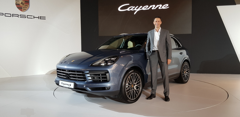 SDAP CEO Arnt Bayer with the new Porsche Cayenne.
