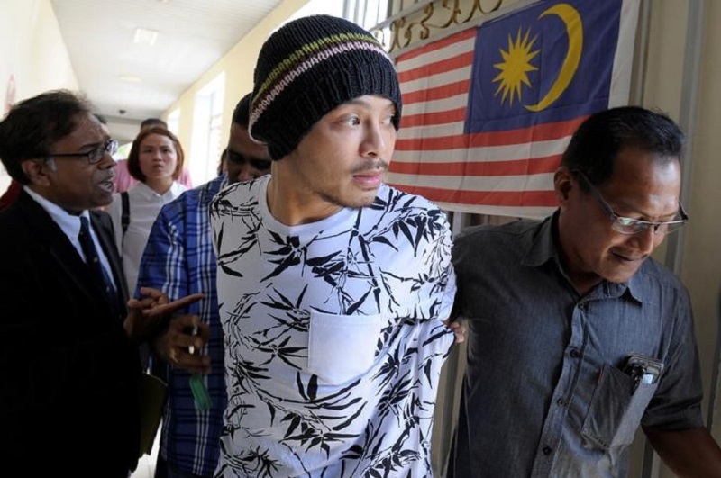Rapper Namewee, whose real name is Wee Meng Chee, is pictured leaving a courtroom in Penang August 25, 2016. u00e2u20acu201d Reuters pic