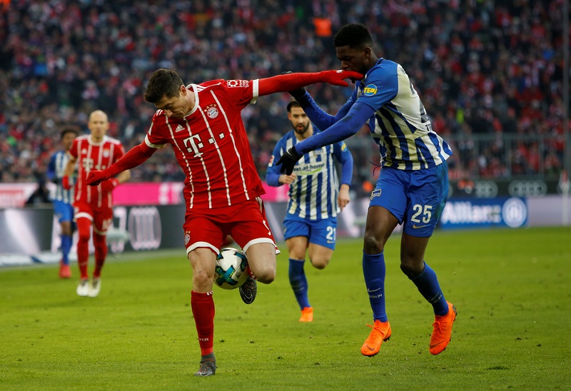 Bayern Munichu00e2u20acu2122s Robert Lewandowski in action with Hertha Berlinu00e2u20acu2122s Jordan Torunarigha at the Allianz Arena in Munich February 24, 2018. u00e2u20acu201d Reuters pic