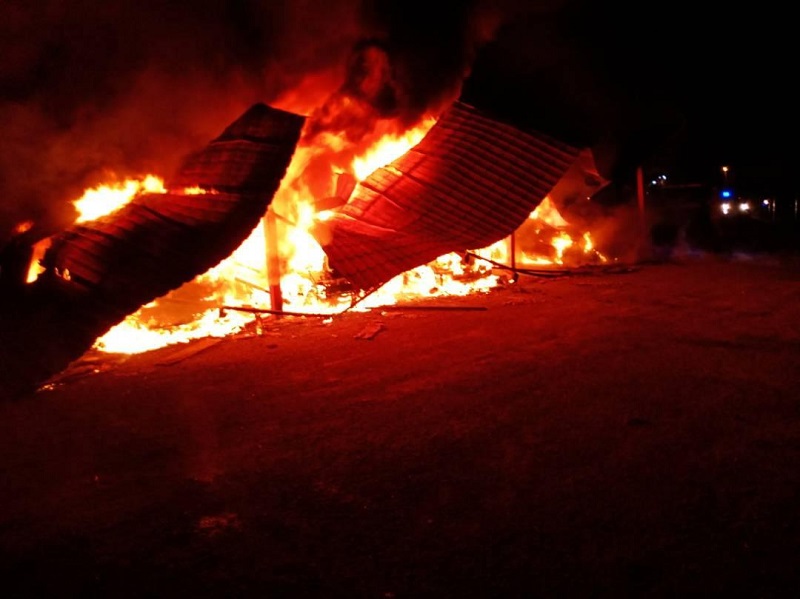 A fire at the Kuala Kangsar Road Transport Department destroyed five vehicles, three of which belonged to the department. u00e2u20acu201d Pictures courtesy of Fire and Rescue Department