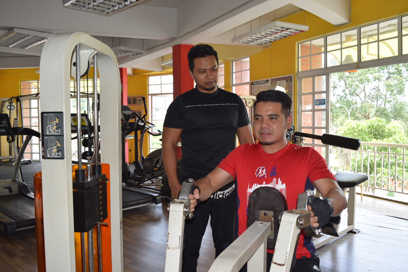 Average Joe Gym manager Mohd Shahir (left) said dedication is of the utmost importance if one wants to see progress after signing up at a gym.