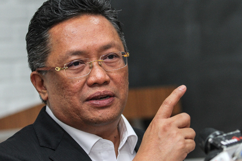Barisan Nasional Strategic Communication director Datuk Seri Abdul Rahman Dahlan speaks during the press conference about Ijok settler land at Cyber Garden Office View February 14, 2018. u00e2u20acu201d Picture by Shafwan Zaidon