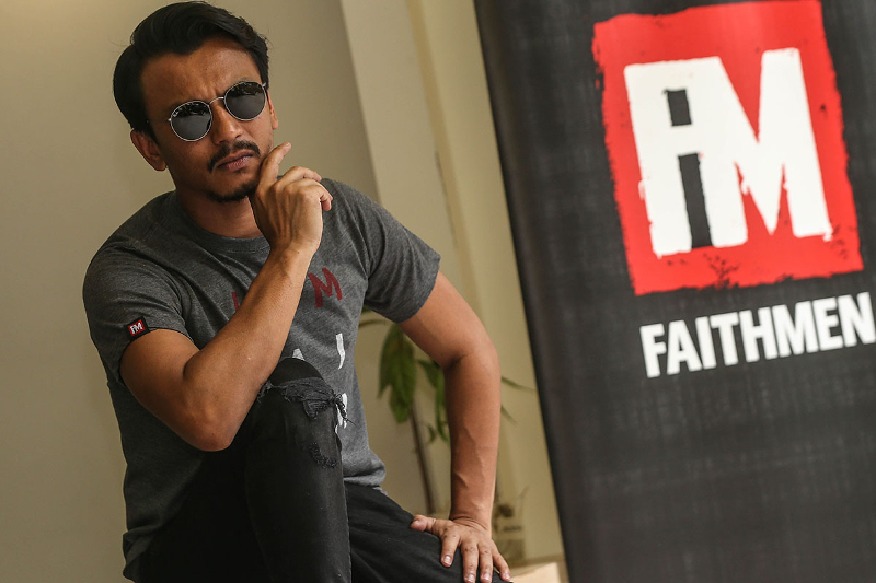 Singer and songwriter Faizal Tahir,  poses for a picture after at a press conference in Craft Origin Cafe, Petaling Jaya February 22, 2018. u00e2u20acu201d Picture by Hari Anggara
