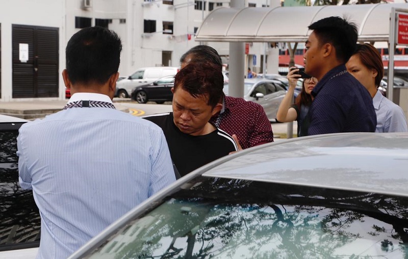 Malaysian Khoo Kea Leng was taken back to the scene where his transaction between ex-City Harvest Church fund manager Chew Eng Han took place, at Marine Drive on Feb 27, 2018. u00e2u20acu201d TODAY pic