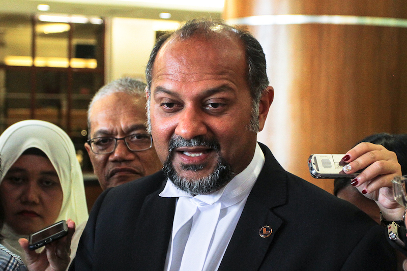 Chairman of DAP's legal bureau  Gobind Singh Deo speaks to the media after filing the suit against  the RoS at Duta court, Kuala Lumpur February 21, 2018. u00e2u20acu201d Picture Shafwan Zaidon