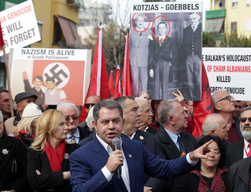 Albanian leader of the Party for Justice, Integration and Unity (PDIU) Shpetim Idrizi (centre) delivers his speech to the members of the Albanian Cham community as they protest against Albania-Greece talks, in front of Greek Embassy in Tirana, Albania, Fe