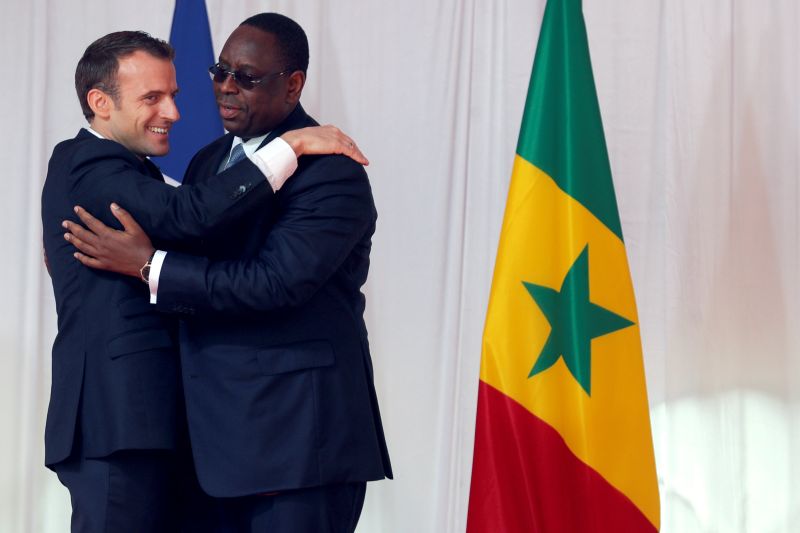 Senegalese President Macky Sall and French President Emmanuel Macron hug following Macron's speech in Saint-Louis, Senegal February 3, 2018. u00e2u20acu201d Reuters pic