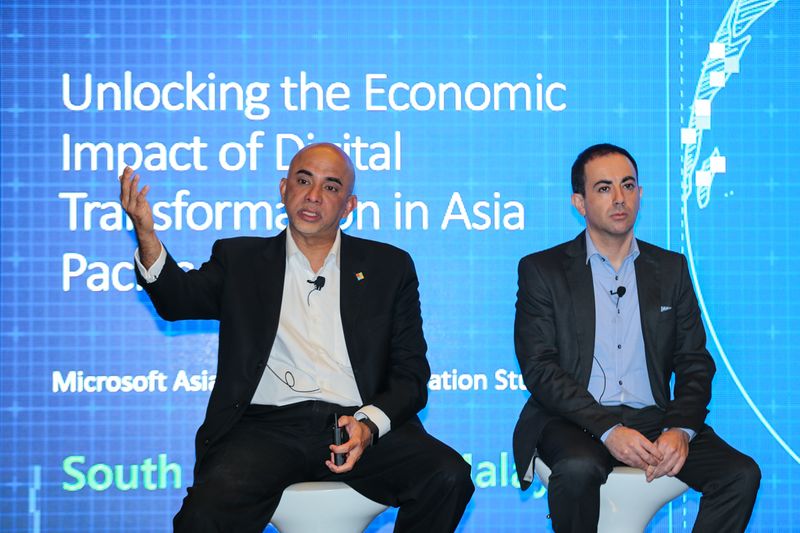 K. Raman (left), Microsoft Malaysiau00e2u20acu2122s Managing Director predicts Malaysiau00e2u20acu2122s GDP will be derived from digital products and services within the next four years. u00e2u20acu201d Picture by Ahmad Zamzahuri