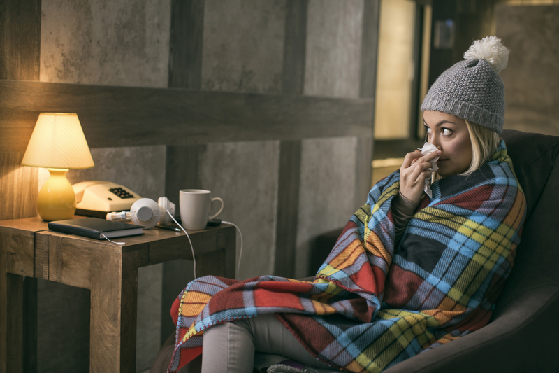 Those struck down by flu must be careful to properly rehydrate according to experts. u00e2u20acu201d hoozone/Istock.com