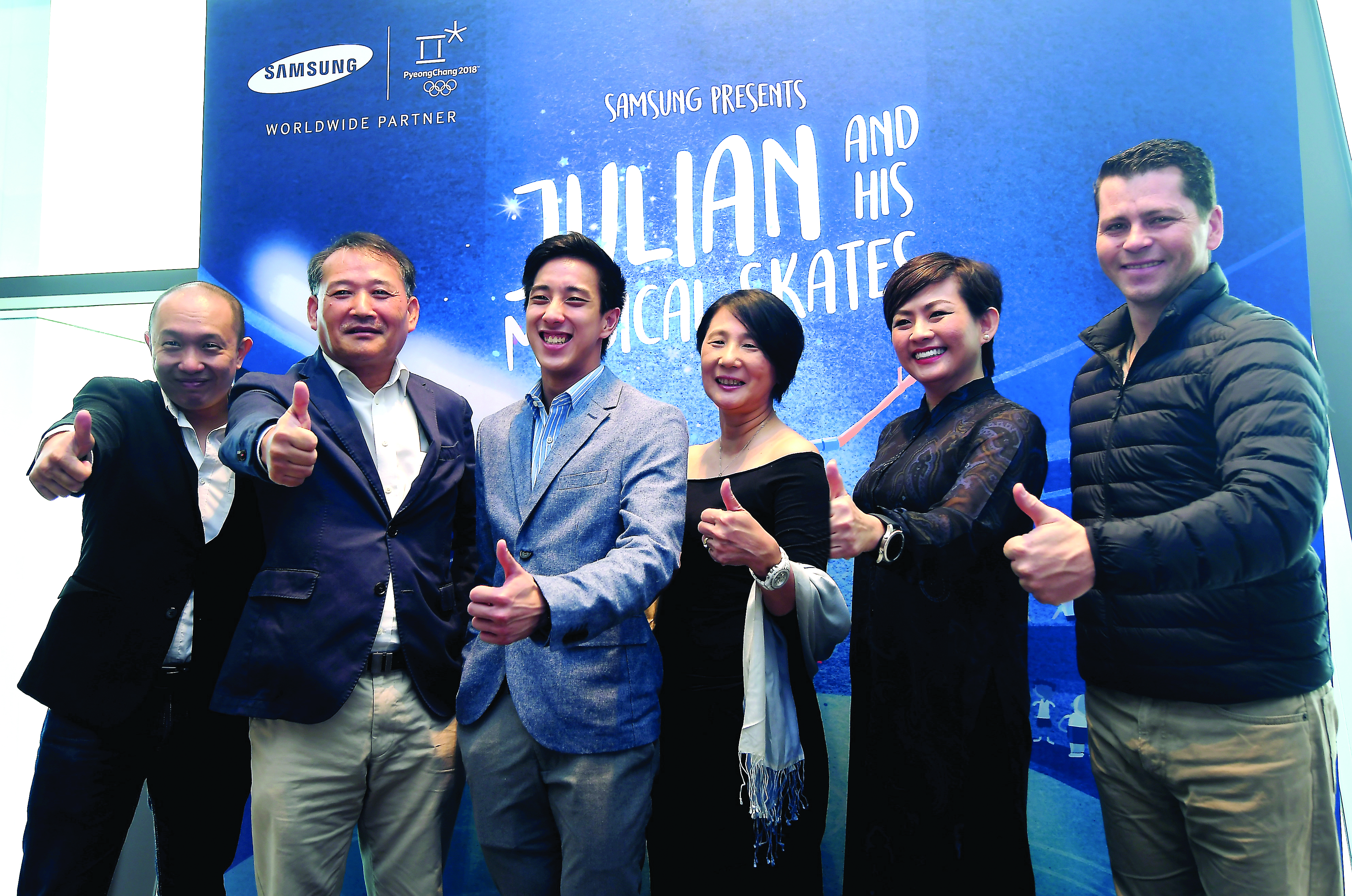 Julian (3rd from right) will have Irene (third from left) by his side in PyeongChang. u00e2u20acu201d Picture by Bernama