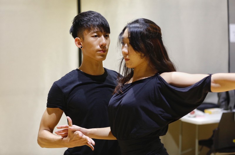 Undergraduate Lum Soon Keong practises Latin dance with his girlfriend. — TODAY pic