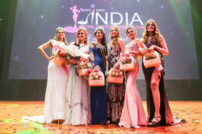 The title of Mrs India Worldwide Malaysia 2018 went to Jeya Priya Pandian (third left) and Amrit Kaur Dhillon Ikbal Singh (fourth left) won Miss India Worldwide Malaysia 2018. u00e2u20acu2022 Picture courtesy of Miss and Mrs India Worldwide Malaysia