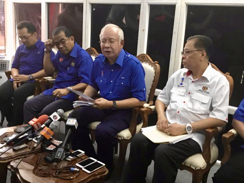 Prime Minister Datuk Seri Najib Tun Razak (third from left) speaks to reporters after a community event in Muar on February 9, 2018. u00e2u20acu201d Picture by Ben Tan