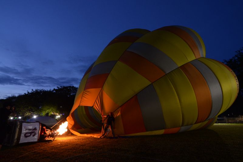 Crew members preparing the hot air balloon at the festival in George Town February 24, 2018.