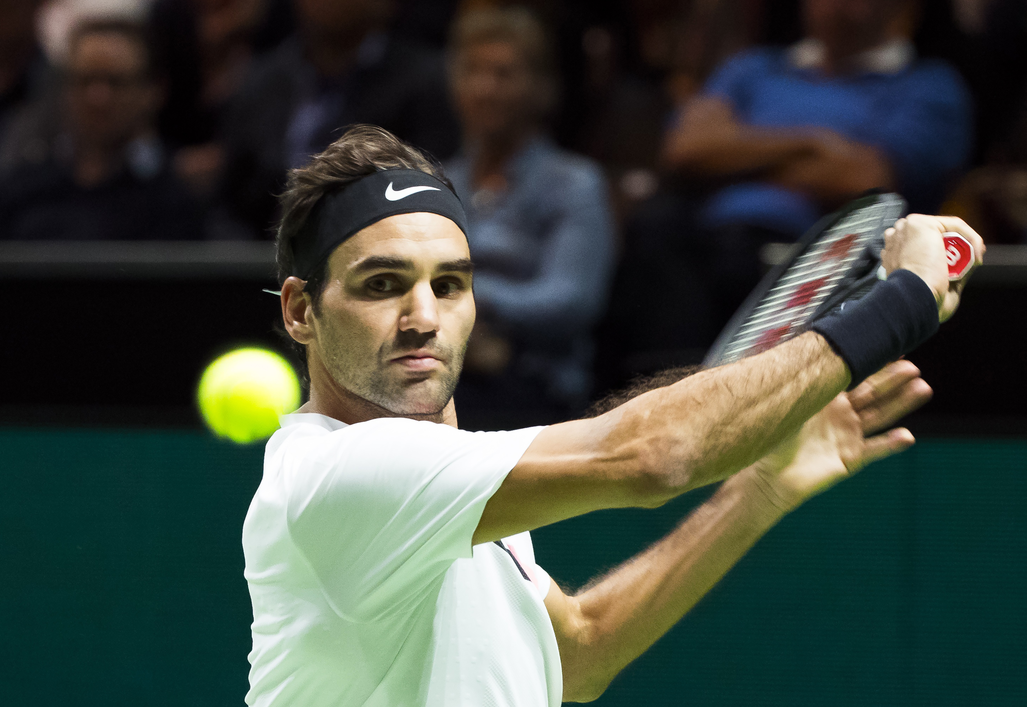 Roger Federer of Switzerland plays a backhand return to Philipp Kohlschreiber of Germany during their second round singles match for the ABN AMRO World Tennis Tournament in Rotterdam on February 15, 2018. u00e2u20acu201d AFP pic