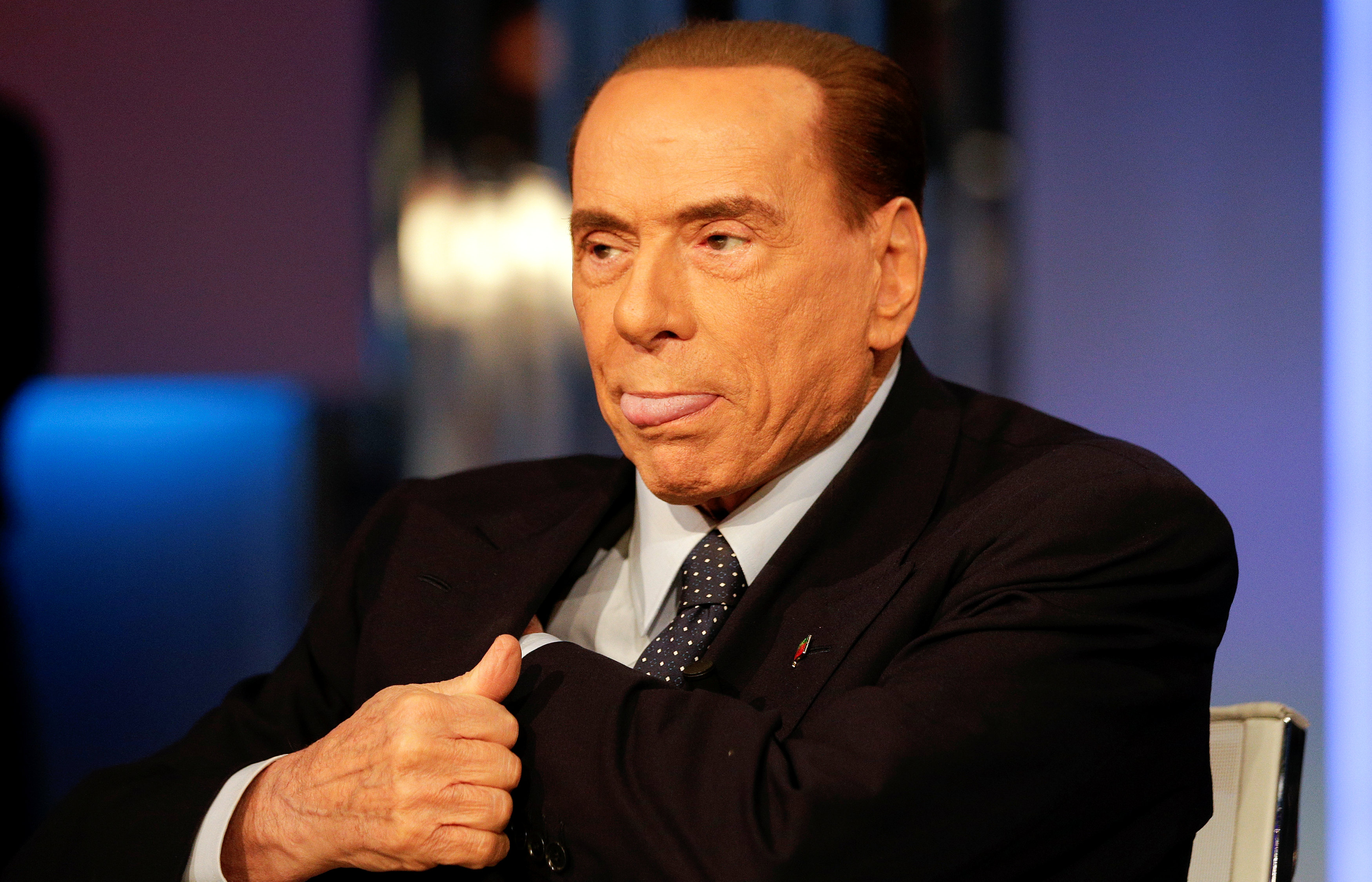 Italy's former Prime Minister Silvio Berlusconi reacts before the taping of the television talk show '8 e mezzo' (8 and half) in Rome, Italy February 21, 2018. u00e2u20acu201d Reuters pic