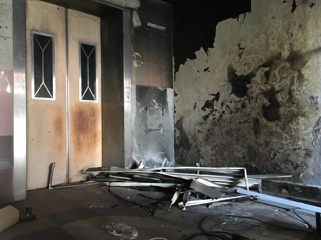 Photos of the incident circulating on social media showed a charred lift landing, with the walls and ceiling covered with soot. u00e2u20acu201d Picture by Najeer Yusof/TODAYn