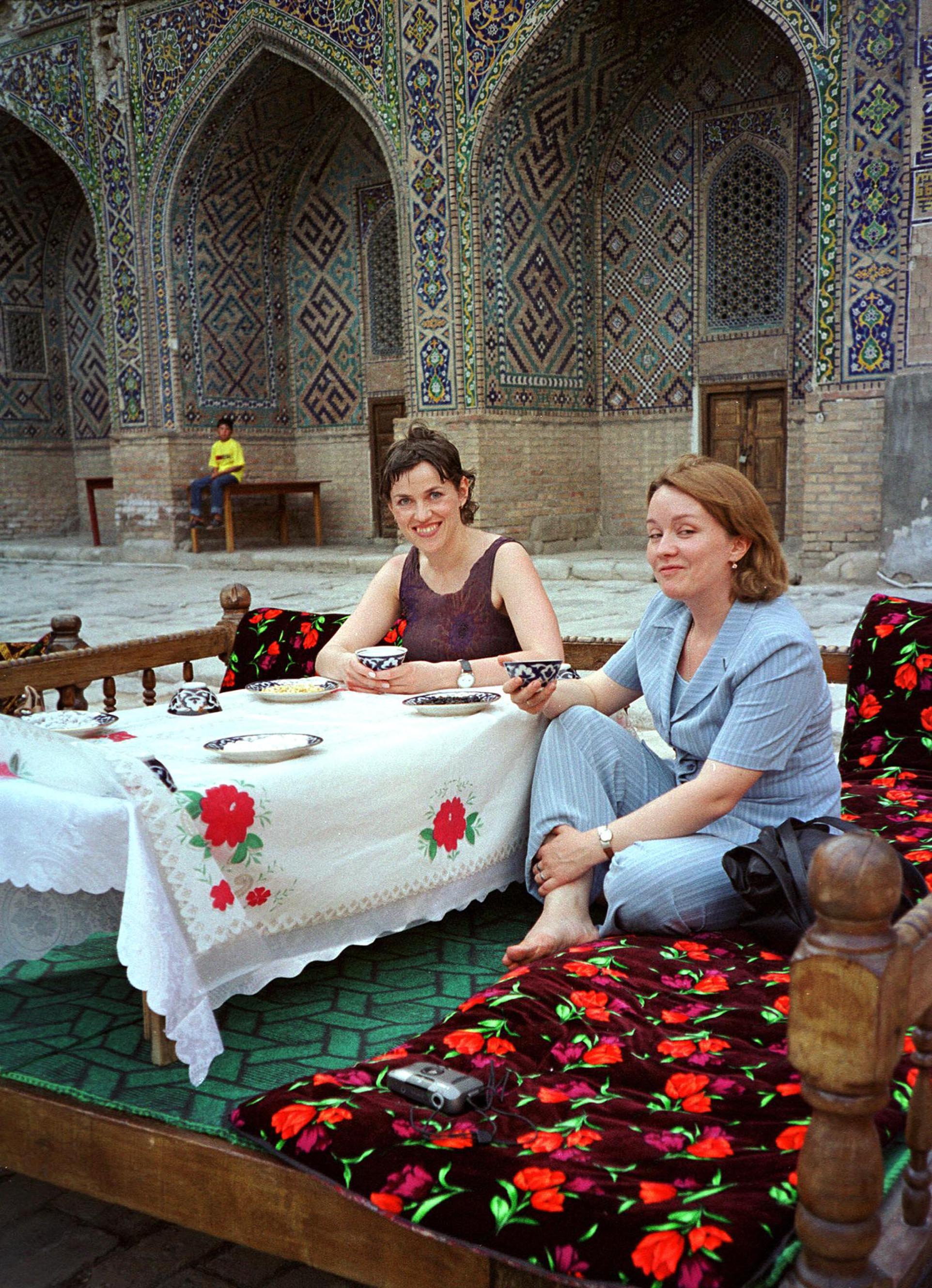 This file photo taken on July 13, 2003 shows tourists having their tea in downtown Samarkand. nu00e2u20acu201d AFP pic 