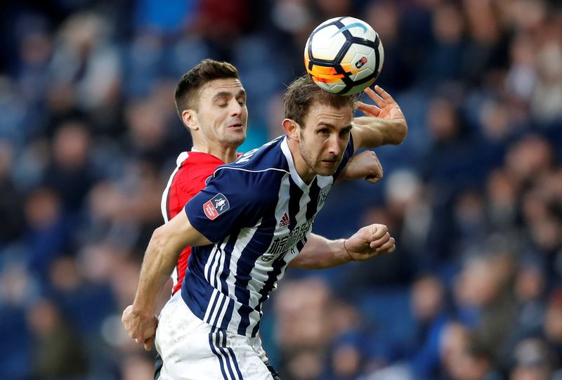 West Bromwich Albionu00e2u20acu2122s Craig Dawson in action with Southamptonu00e2u20acu2122s Dusan Tadic during their FA Cup Fifth Round match at The Hawthorns, West Bromwich, February 17, 2018. u00e2u20acu201d Reuters pic