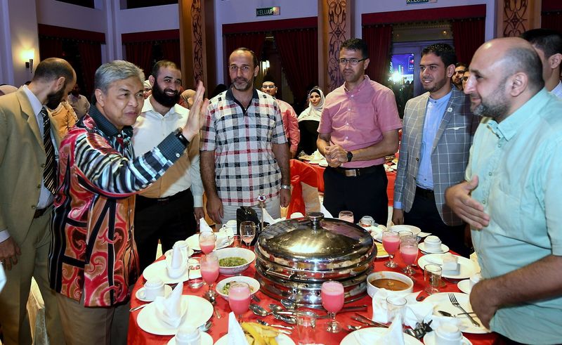 Deputy Prime Minister Datuk Seri Dr Ahmad Zahid Hamidi having a light moment with the participants from Syria and Palestine during the launching of Refugee Children Empowering Programme at Seri Satria in Putrajaya, February 2, 2018. u00e2u20acu201d Bernama pic