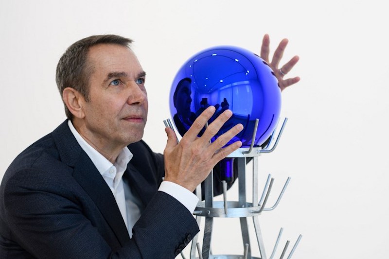 Jeff Koons poses with his piece u00e2u20acu02dcGazing Ball (Bottlerack)u00e2u20acu2122, 2016, during an interview with AFP in Hong Kong March 27, 2018. u00e2u20acu201d AFP pic