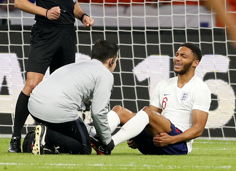 Englandu00e2u20acu2122s Joe Gomez receives medical attention during the match against Netherlands at the Johan Cruijff Arena in Amsterdam March 23, 2018. u00e2u20acu201d Picture by Action Images via Reuters 