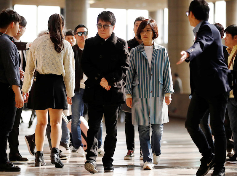 South Korean singers Cho Yong-pil and Lee Sun-hee arrive at a ceremony before leaving for Pyongyang, at the Gimpo International airport in Seoul March 31, 2018. — Reuters pic