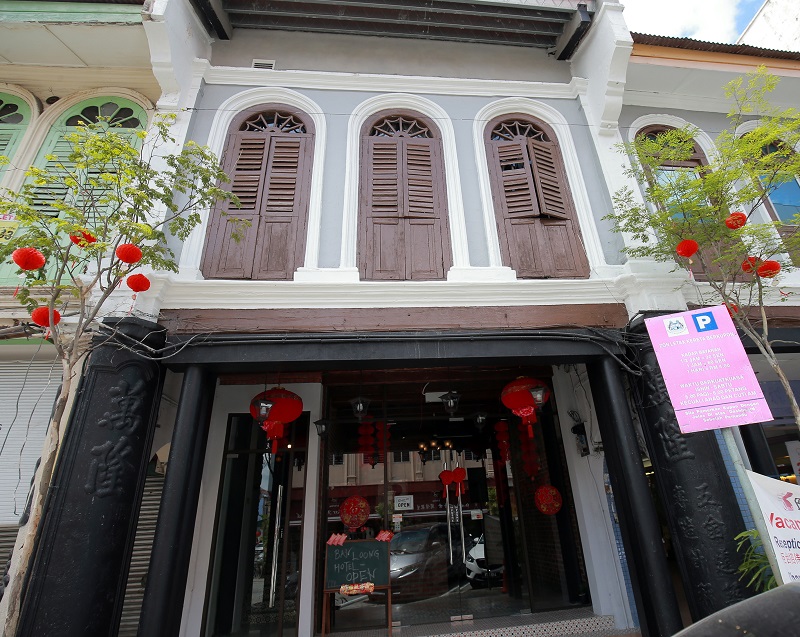 The Ban Loong hotel still maintains many aspects of the original 102-year-old structure, which is evident in its decoration and furnishings. — Picture by Marcus Pheong