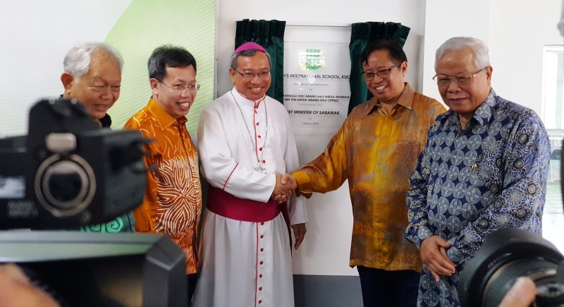 Sarawak Chief Minister Datuk Patinggi Abang Johari Openg (second right) poses for a group picture with Archbishop of Kuching Simon Peter Poh (third left) at the opening of St Joseph International Private School in Kuching March 3, 2018. u00e2u20acu201d Picture by Sul