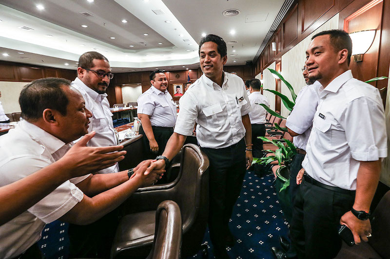 Umno Youth chief Khairy Jamaluddin shakes hands before chairing the Umno Youth executive council meeting in Kuala Lumpur March 8, 2018. u00e2u20acu201d Picture by Hari Anggara