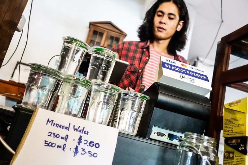 Analog Cafe had to stop offering free filtered water to customers during the water supply disruptions and had to start selling bottled mineral water.