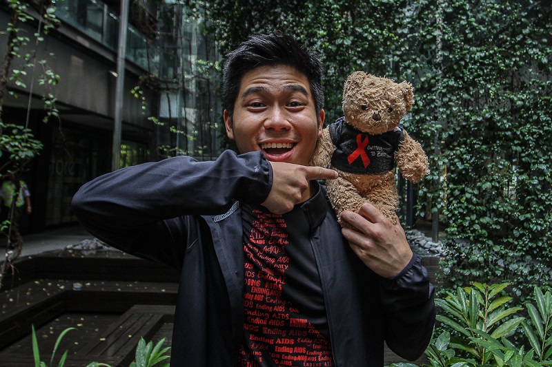 Jeff Lau with his sidekick, the Malaysian AIDS Foundation teddy bear. u00e2u20acu201d Picture by Shafwan Zaidon 