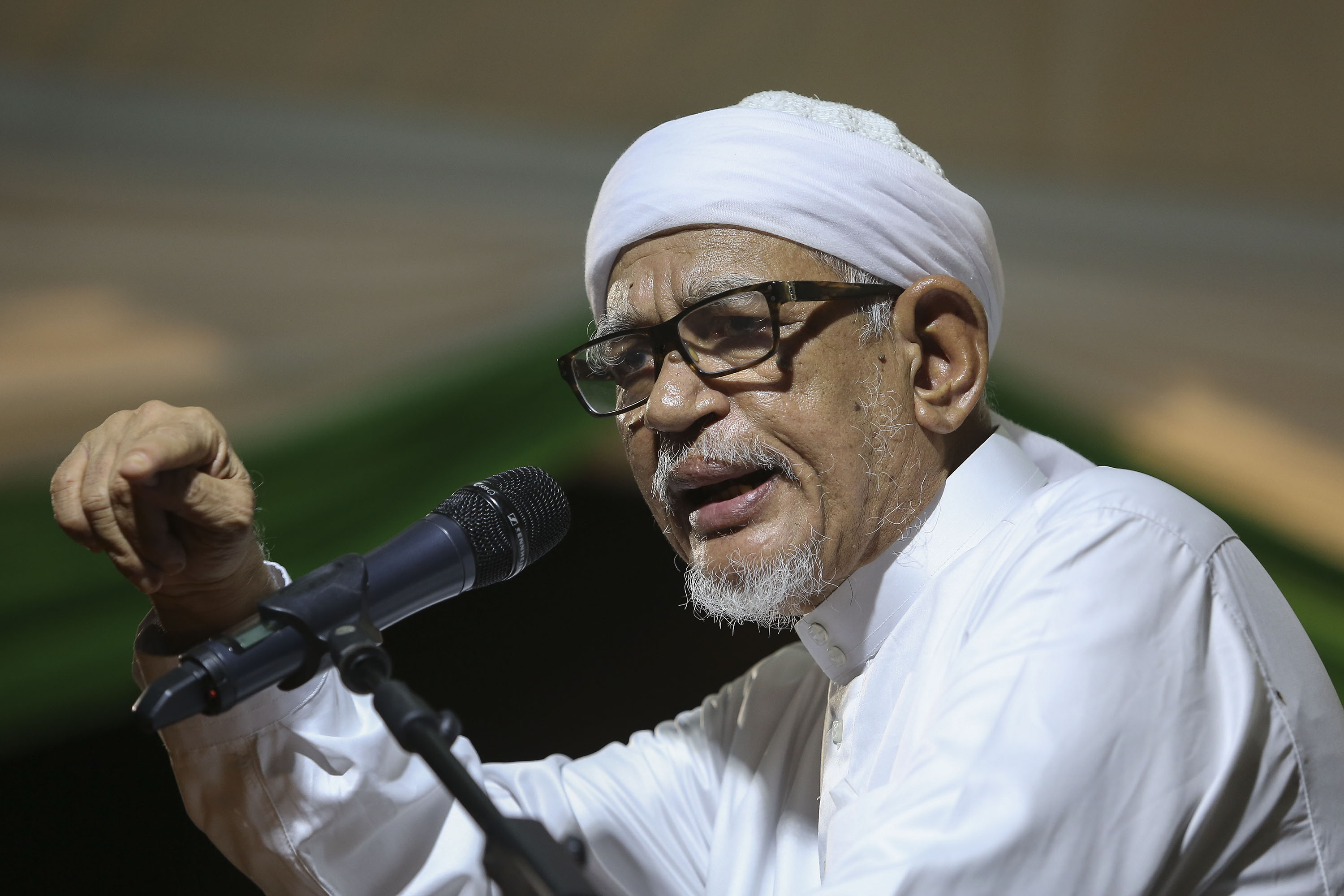 PAS president Datuk Seri Abdul Hadi Awang addresses the crowd during a celebration to commemorate 10 years in Selangor state government at Stadium JKR Selangor in Shah Alam March 17, 2018. u00e2u20acu201d Picture by Yusof Mat Isa