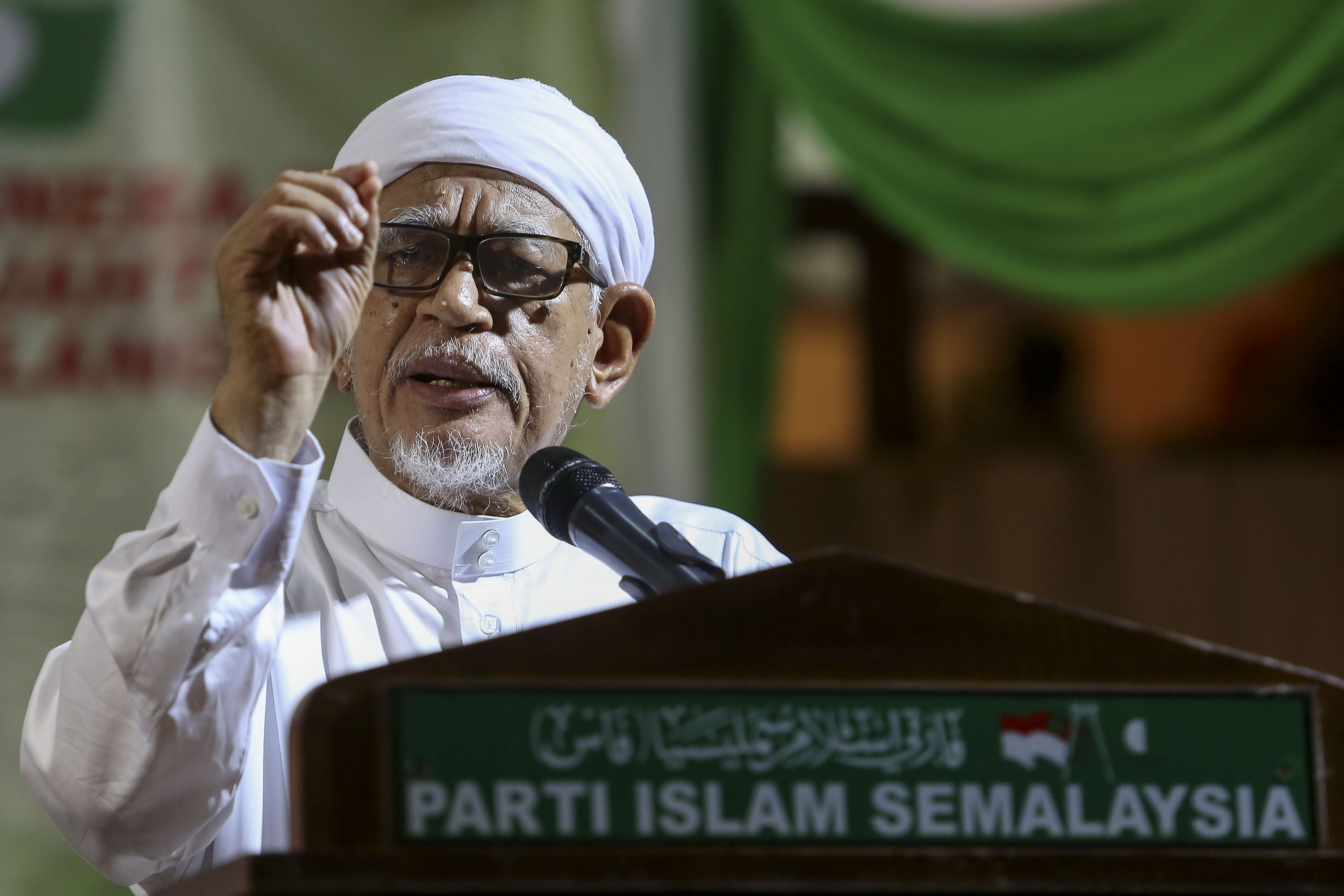 PAS president Datuk Seri Abdul Hadi Awang addresses the crowd during a celebration to commemorate 10 years in Selangor state government at Stadium JKR Selangor in Shah Alam March 17, 2018. u00e2u20acu201d Picture by Yusof Mat Isa