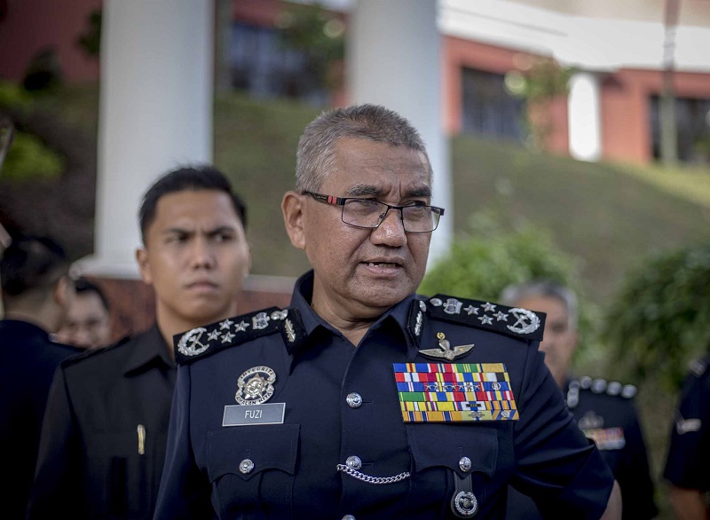 Inspector-General of Police Tan Sri Mohamad Fuzi Harun speaks during a press conference after the Police Family Association annual meeting in Kuala Lumpur March 22, 2018. u00e2u20acu201d Picture by Firdaus Latif