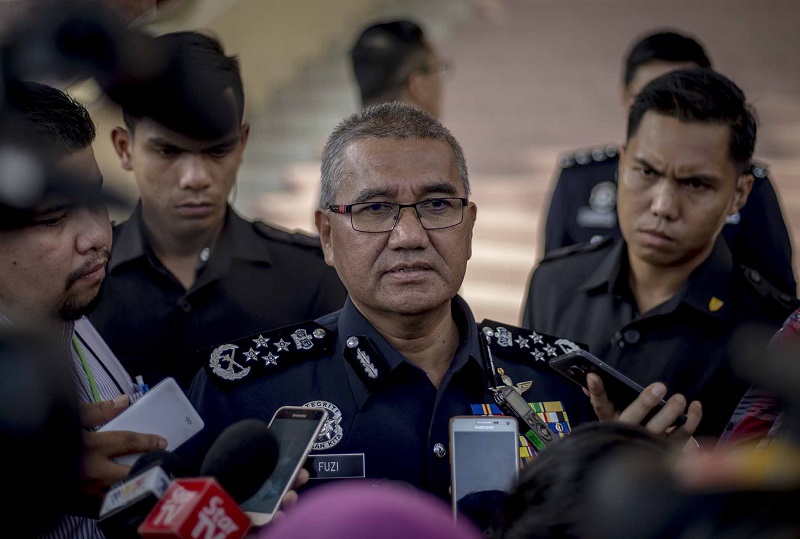 Inspector-General of Police Tan Sri Mohamad Fuzi Harun speaks during a press conference after the Police Family Association annual meeting in Kuala Lumpur March 22, 2018. u00e2u20acu201d Picture by Firdaus Latif