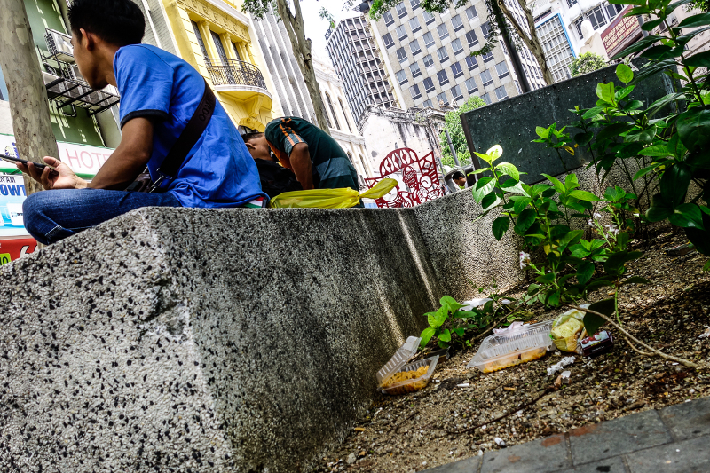 Food containers litter the ground near shop lots at Leboh Pudu. u00e2u20acu201d Picture by Shafwan Zaidon