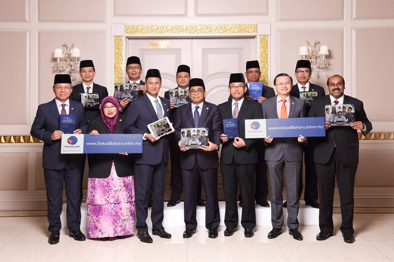 Johor Mentri Besar Mohamed Khaled Nordin (centre) and the state exco during the presentation of the 2013-2018 Achievement Report Card at Universiti Tun Hussein Onn Malaysia in Batu Pahat March 25, 2018. u00e2u20acu201d Picture courtesy of Johor Mentri Besaru00e2u20acu2122s Offic
