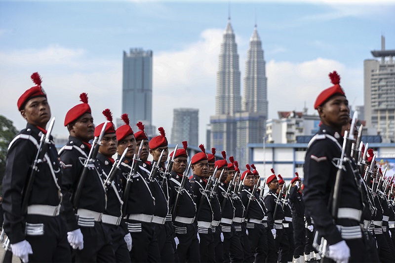 Members of The Royal Malaysian Police take part in the National Police Day parade at Pulapol in Kuala Lumpur March 25, 2018. u00e2u20acu201d Picture by Azneal Ishak