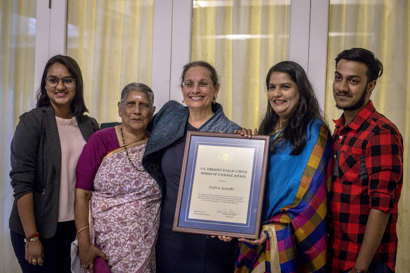 (From left) Tevi Darsiny, S. Renggamah, US Ambassador to Malaysia Kamala Shirin Lakhdhir, Indira Gandhi and Karan Dinish pose for a group photo after Gandhi was presented the Women of Courage Award at the US embassy in Kuala Lumpur March 28, 2018. — Pictures by Firdaus Latif