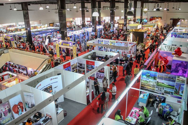 A birdu00e2u20acu2122s-eye view of the crowd checking out the various travel deals on offer at the 2018 Matta Fair in Kuala Lumpur March 16, 2017. u00e2u20acu2022 Picture by Hari Anggara