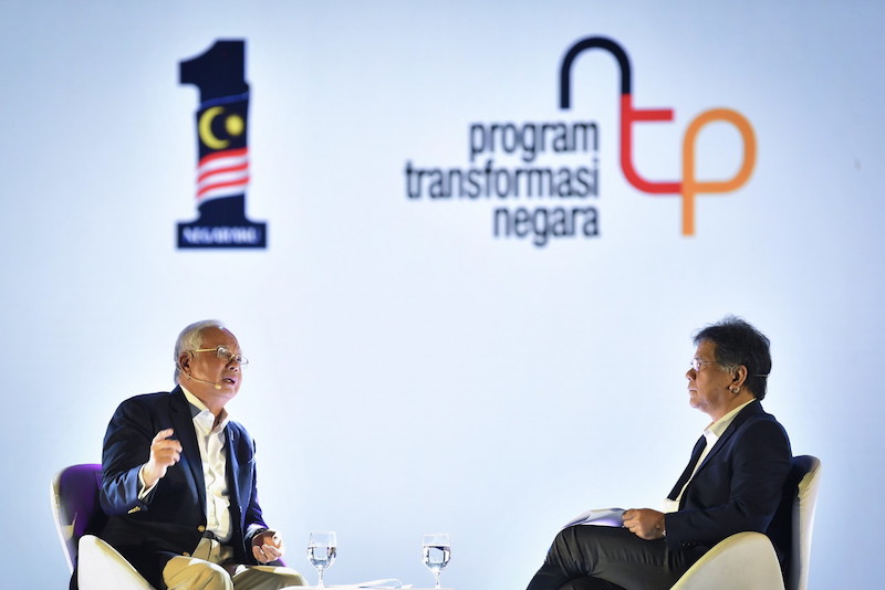 Prime Minister Datuk Seri Najib Razak seen with Datuk Seri Idris Jala during a dialogue session in conjunction with the National Transformation Programme (NTP) Annual Report 2017 Review in Kuala Lumpur March 23, 2018. u00e2u20acu201d Bernama pic