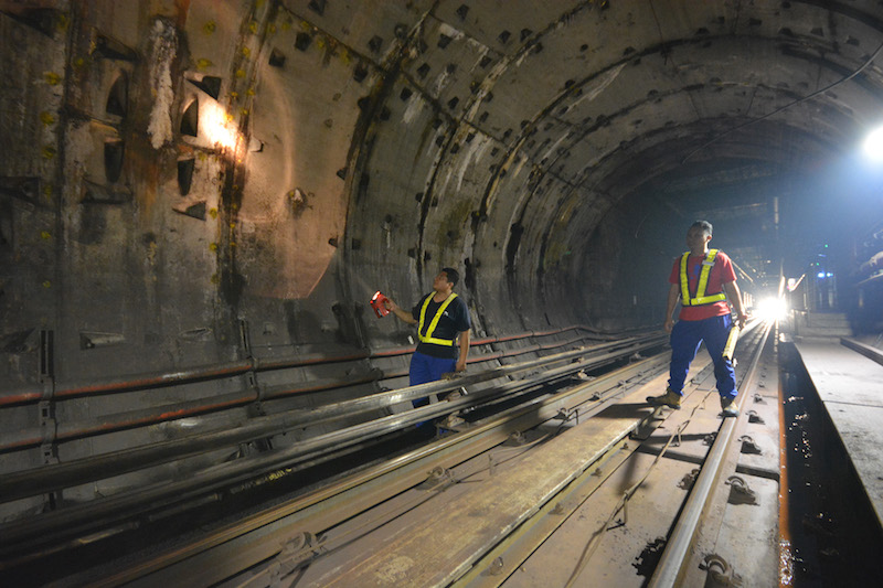 Prasaranau00e2u20acu2122s maintenance team checking the walls of the tunnel which runs from Masjid Jamek to Ampang Park. u00e2u20acu201d Picture courtesy of Prasarana
