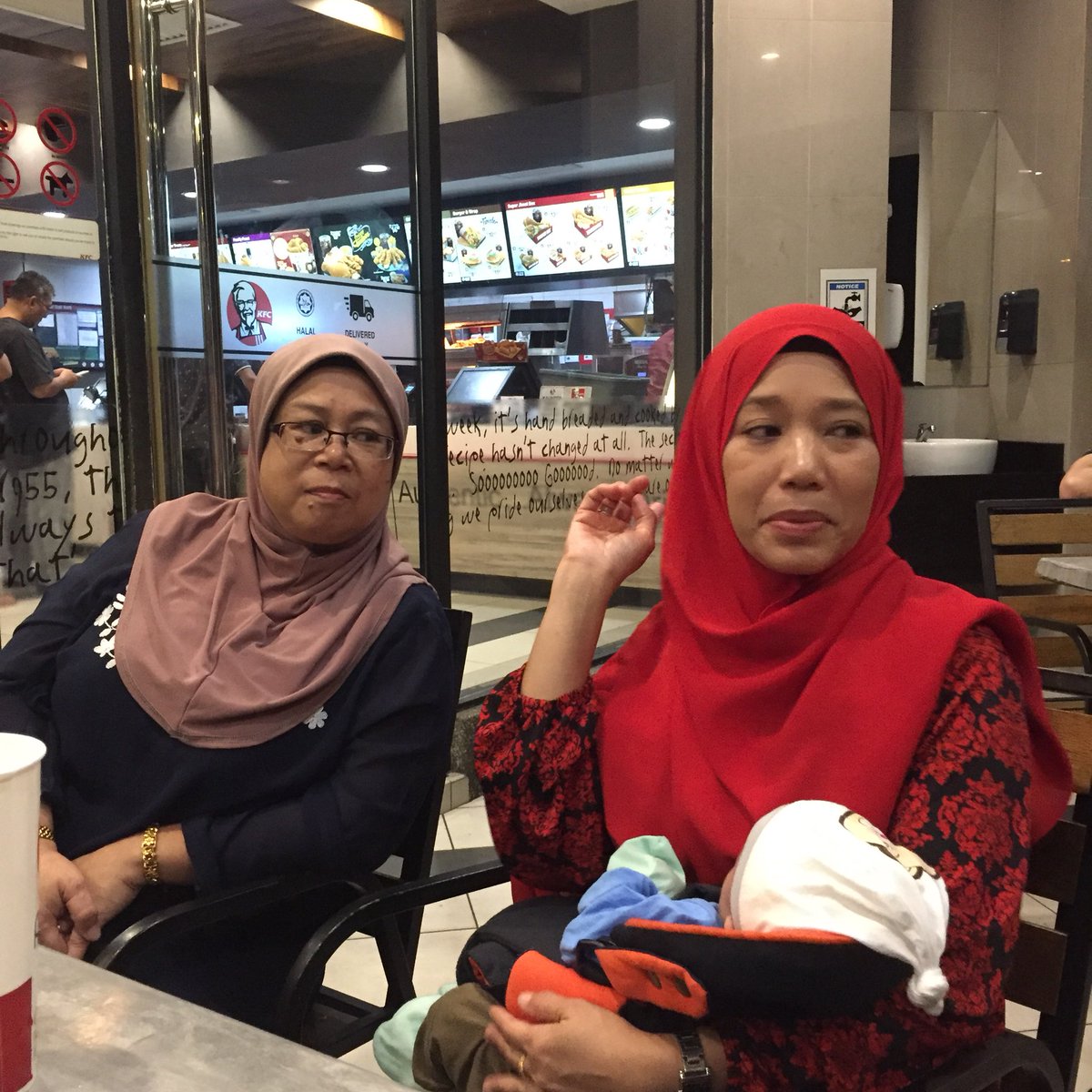The two mothers, Siti and Ayu’s unnamed foster mother. — Picture via Twitter/@ynrazak