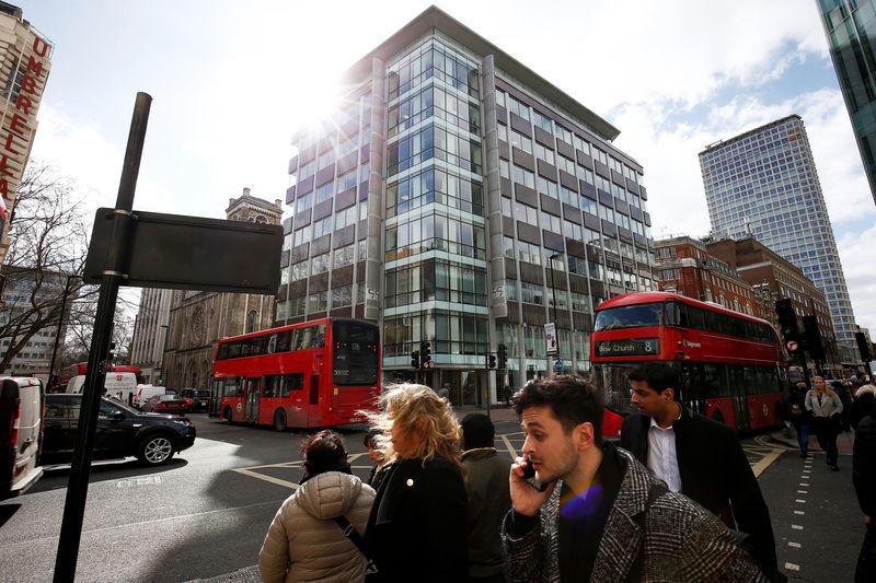 People walk past the building housing the offices of Cambridge Analytica in central London, March 20, 2018. u00e2u20acu201d Reuters pic