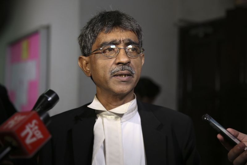 Lawyer, Haniff Khatri Abdulla, speaks to journalists outside the courtroom of the Shah Alam High Court on March 29, 2018. u00e2u20acu2022 Picture by Yusof Mat Isann
