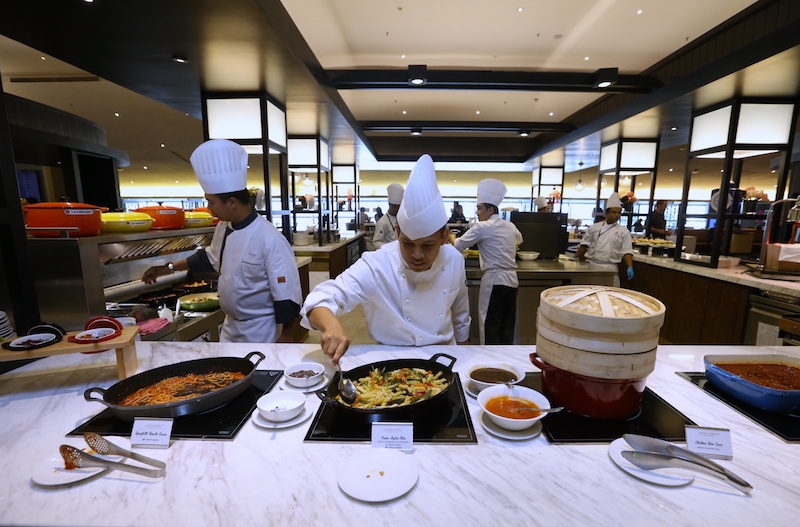 Food is cooked to order at the Golden Lounge in KLIA. — Picture by Zuraneeza Zulkifli