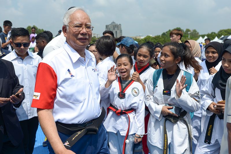 Prime Minister Datuk Seri Najib Razak posing for photographs with participants during the opening ceremony of the World Taekwondo Malaysia Open at Putrajaya International Convention Center, March 4, 2018. u00e2u20acu201d Picture by Mukhriz Hazim