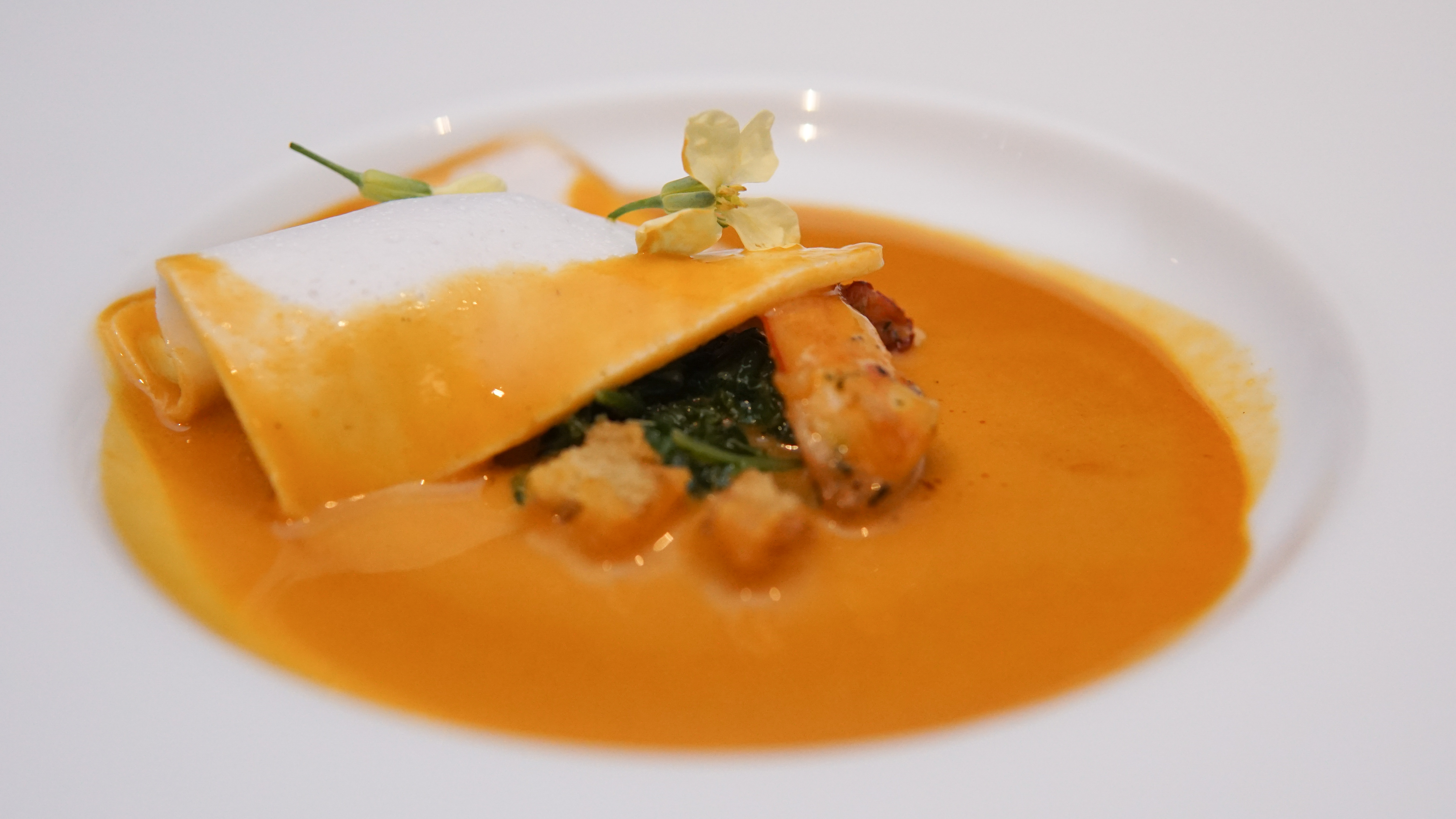 'Moqueca' accompanied with greens.  nn