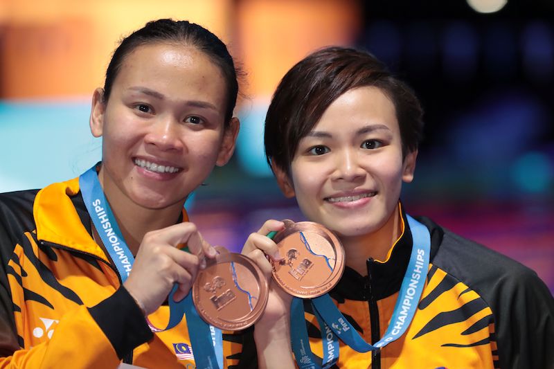 Jun Hoong (left) and Pandelela maintain their consistent performance with another podium finish. u00e2u20acu201d Malay Mail file pic